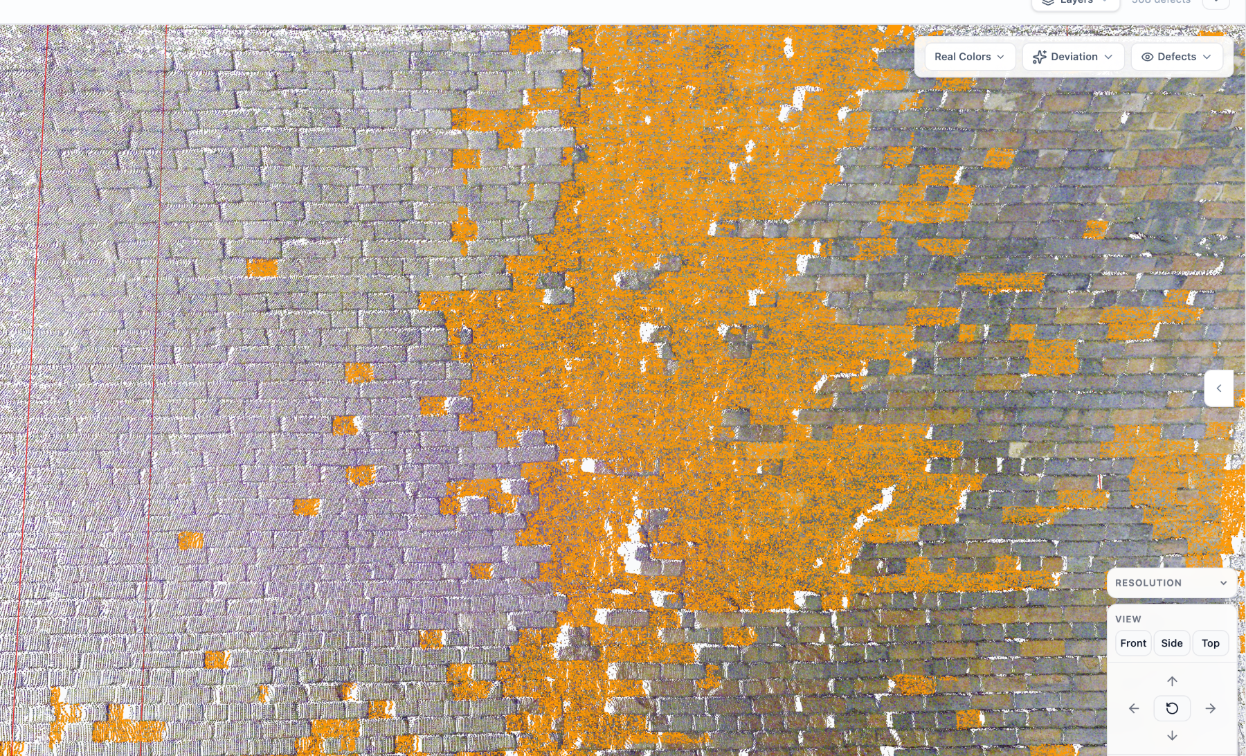 Close-up of detected spalling on the tunnel's left wall, with each affected brick highlighted and the defect quantified in mm² and mm³